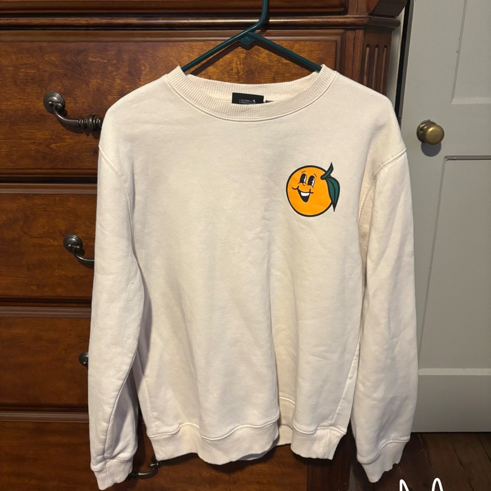 Cream Sweater with Orange Graphic
